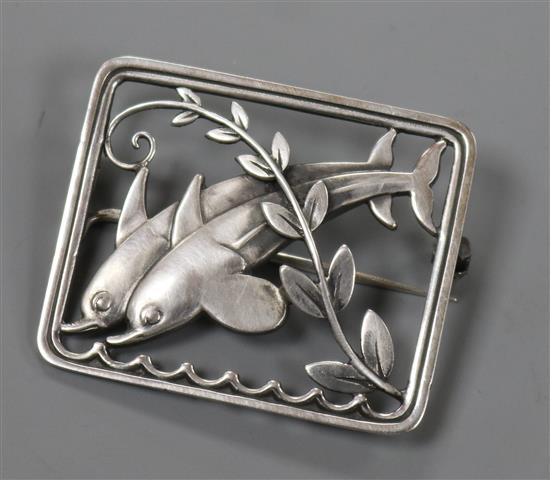 A Danish Georg Jensen sterling silver square twin leaping dolphin brooch, no. 251, 36mm.